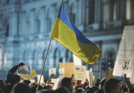 The Ukranian flag held aloft at a protest