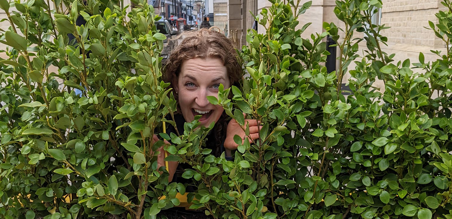 A woman in a bush