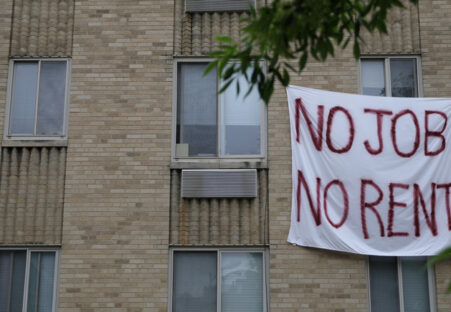 A banner with the words "no job no rent"